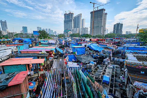 View of Dhobi Ghat (Mahalaxmi Dhobi Ghat) is world largest open air laundromat (lavoir) in Mumbai, India with laundry drying on ropes. Now one of signature landmarks and tourist attractions of Mumbai