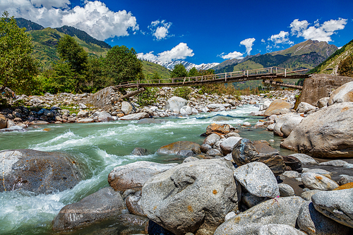 Wooden bridge over Beas River, near Manali in Kullu Valley, Himachal Pradesh, India