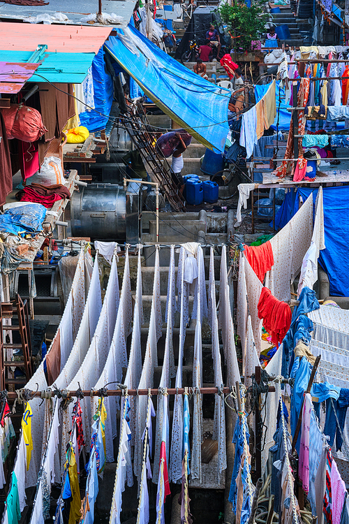 View of Dhobi Ghat (Mahalaxmi Dhobi Ghat) is world largest open air laundromat (lavoir) in Mumbai, India with laundry drying on ropes. Now one of signature landmarks and tourist attractions of Mumbai