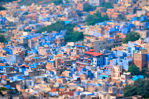 Aerial view of Jodhpur, also known as Blue City due to the vivid blue-painted Brahmin houses around Mehrangarh Fort. Jodphur, Rajasthan, India. Tilt shift miniature toy effect