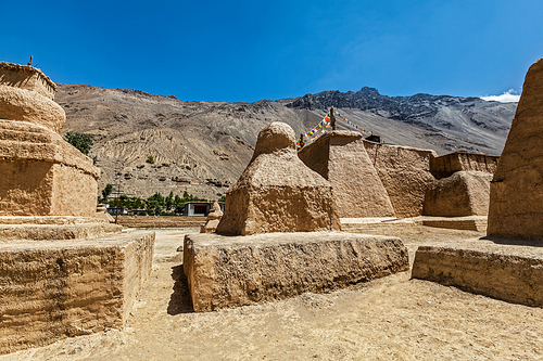 Buddhist Tabo monastery building and gompas made of clay in Tabo village Spiti Valley. Monastery is built on high Himalayan plateau in tradition of Tibetan Buddhism religion. Himachal Pradesh, India