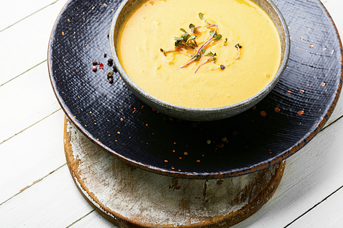 Autumn vegetarian pumpkin cream soup.Pumpkin and carrot soup