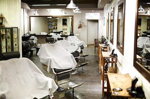 View of interior of equipped barbershop