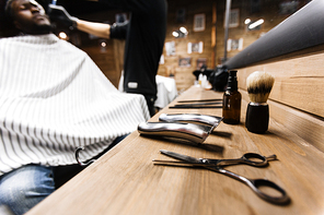 Workplace of barber or hairdresser with shaving kit