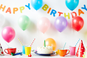 Birthday cake on decorated table