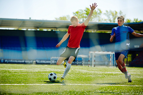 Football player going to shoot the goal