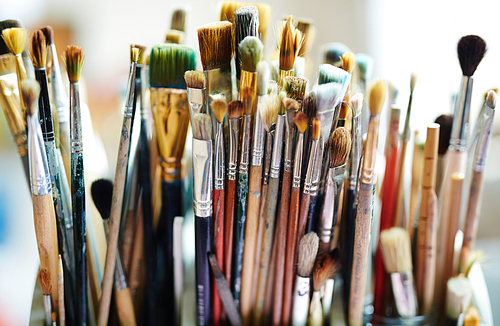 Set of paintbrushes in art studio