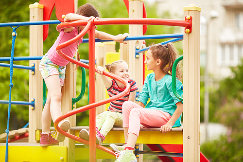 Happy children playing in the playground