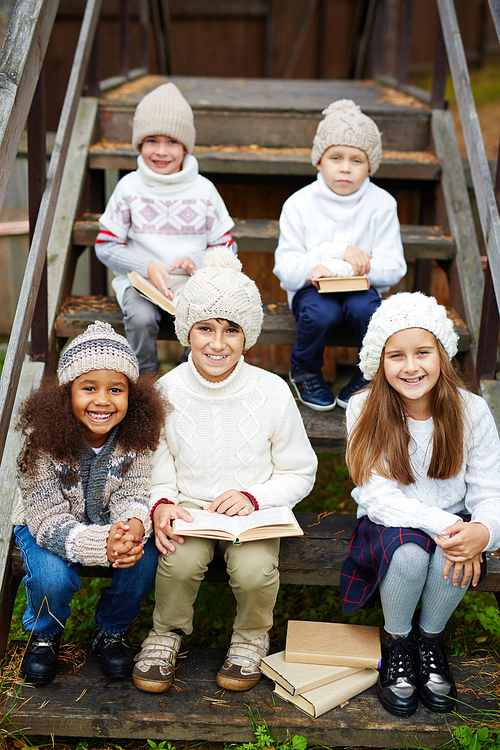 Youthful learners with books 