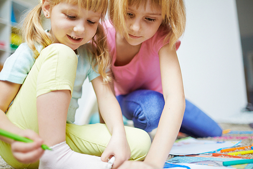 Cute sisters drawing and coloring pictures