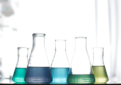 Liquid reagents in transparent beakers