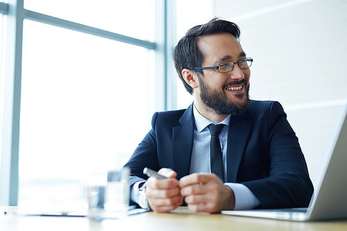 Smiling employee during business talk