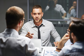 Young managers interacting in office