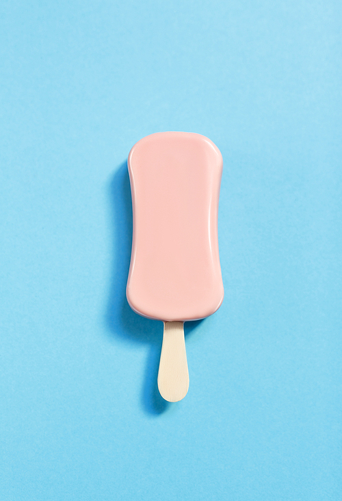 Pink ice-cream over blue background