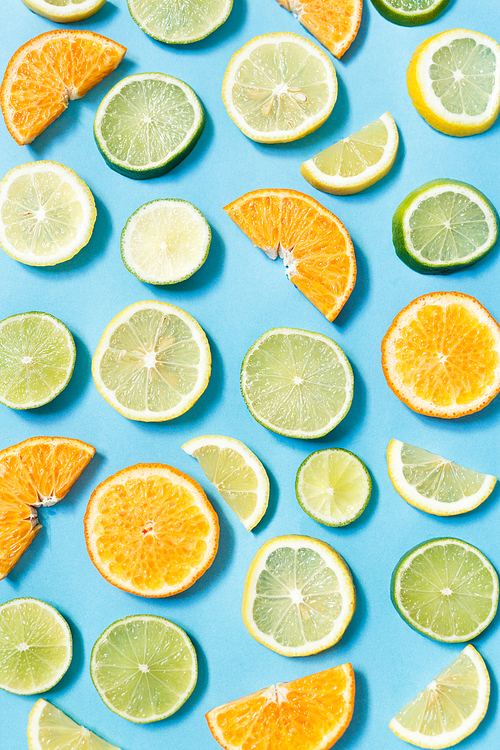 Citrus fruits isolated on blue background