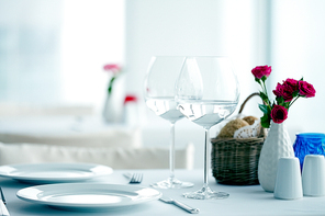 Table at restaurant for two with wineglasses