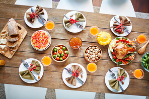 Rustic wooden table with various fall meal