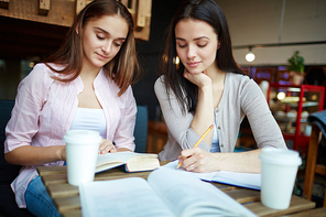 Clever students preparing for the lesson at break