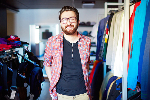 Portrait of male sales assistant in clothing store