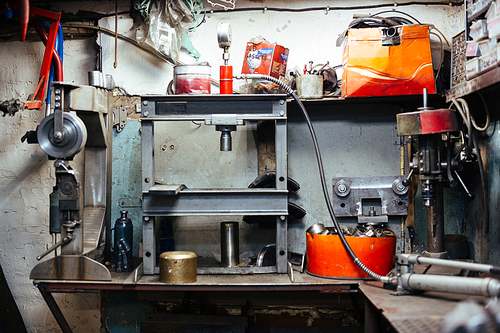 Garage or workroom of repairman with necessary equipment