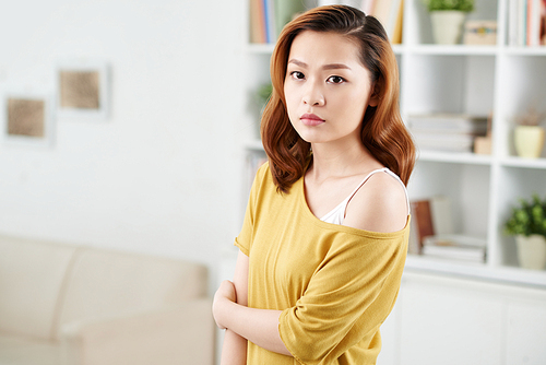 Portrait of beautiful unsmiling Vietnamese woman