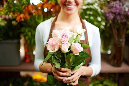 Close-up of rose bouquet in female hands