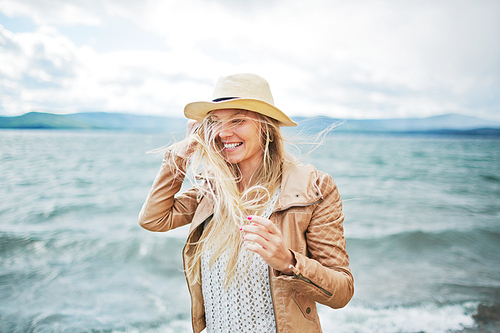 Happy pretty girl on the beach