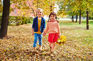 Cute youngsters  while taking walk in park
