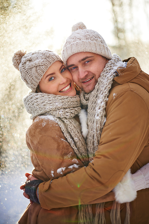 Young dates in winterwear  with smiles