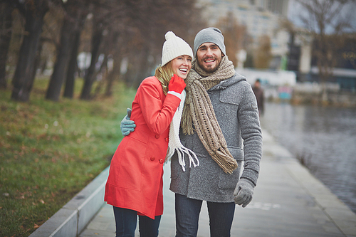 Happy dates walking in urban environment