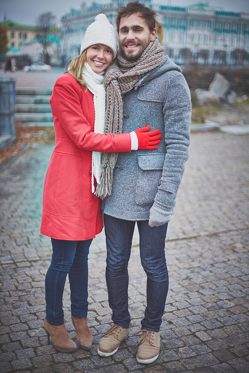 affectionate guy and girl  in urban