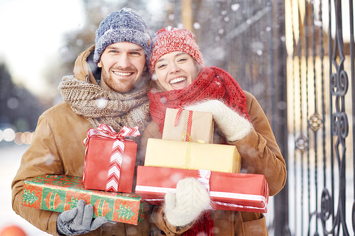 Young couple with Christmas presents 