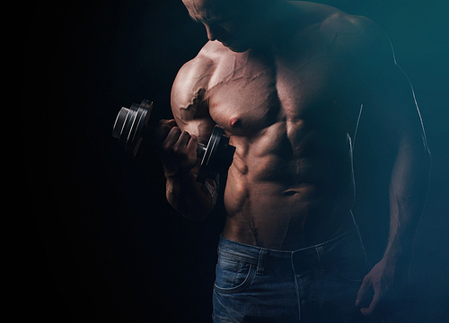 Young bodybuilder doing exercise with barbell