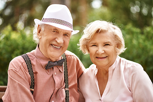 Cheerful seniors  with smiles outdoors