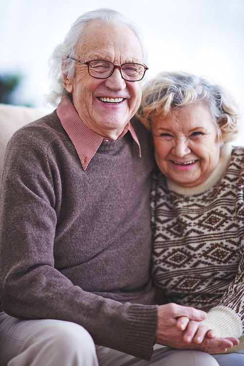 Happy elderly couple  and laughing