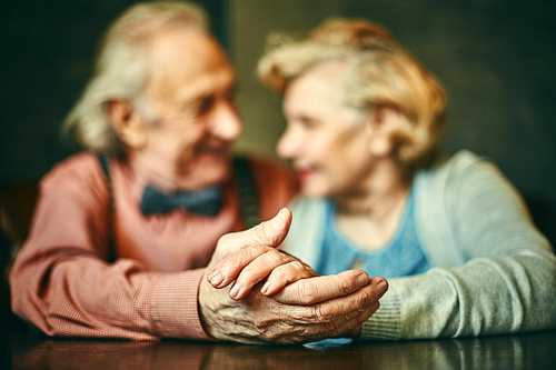 Close-up of hands of elderly couple