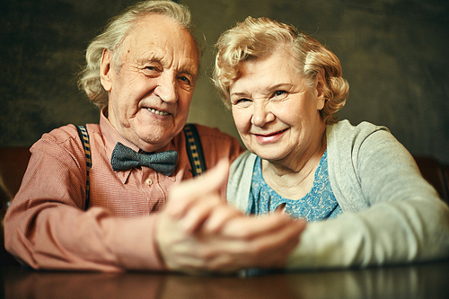Happy retired couple  with smiles