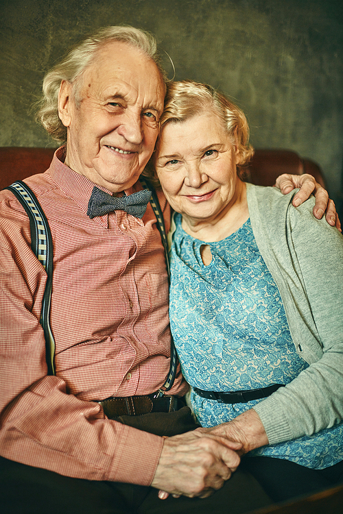 Elegant and affectionate seniors  with smiles