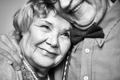 Elderly female and her loving husband