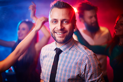 Portrait of a young man in the club