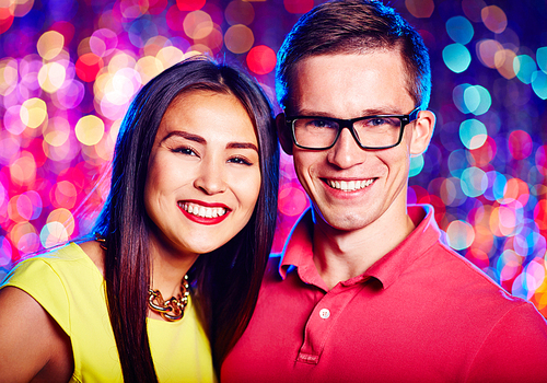 Multi-ethnic young couple  at party