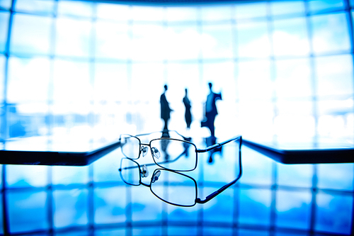 Close-up of glasses on office table