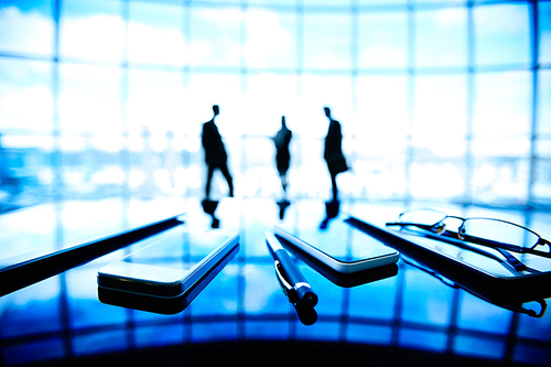 Close-up of mobile phones on office table