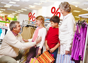 Grandparents and their grandchildren shopping together