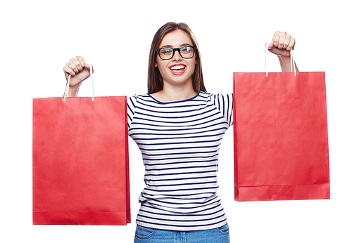 Happy buyer with paperbags  after shopping