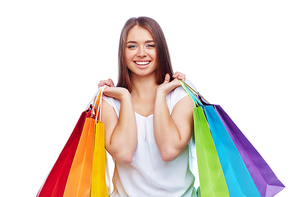 Young consumer carrying paperbags