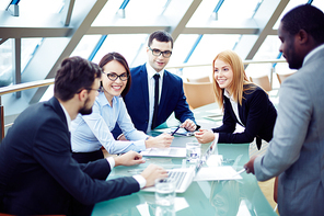 Group of business people planning together