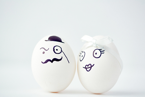 Funny eggs with painted faces