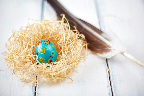Ornate Easter egg with feather