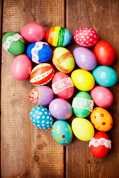 Decorated eggs on wooden table